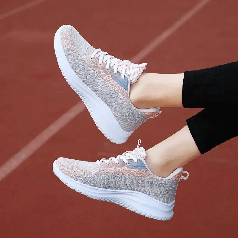 Fashion breathable walking running shoes for women - SF1735 in action, showcasing lightweight and non-slip features on track.